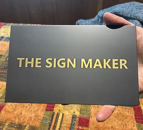 Raised Brass Lettering - Bronzed Background