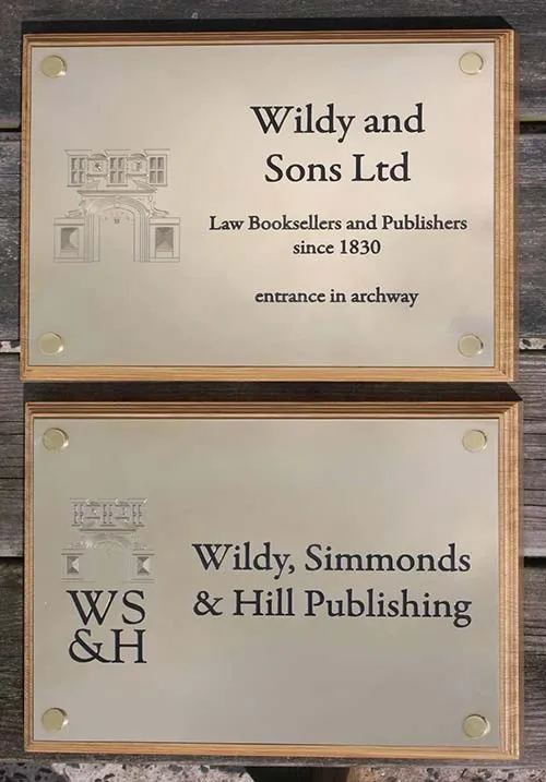 Two Polished Brass Plaques