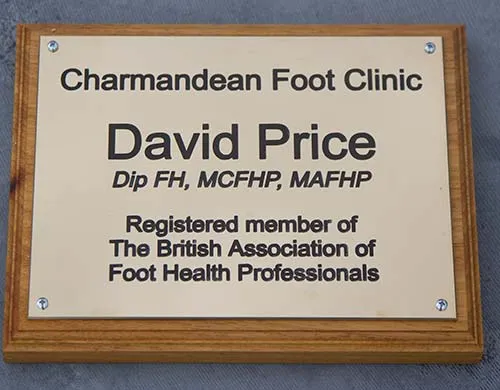 Traditional sign for Health Clinics Brass Plaque on Backing Board