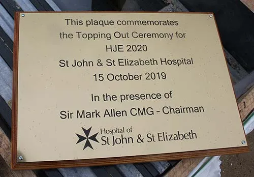 These can be mounted to a backing board Engraved Brass Opening Sign