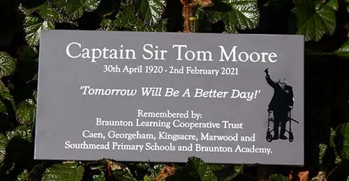 This looks like slate but can be engraved so much smaller. Slate Grey Corian Memorial Plaque
