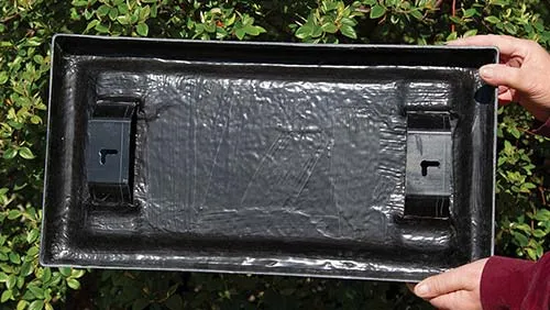 Back of Fibreglass sign showing type D Fittings