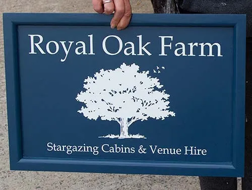 Frame Edged Painted Wooden Sign