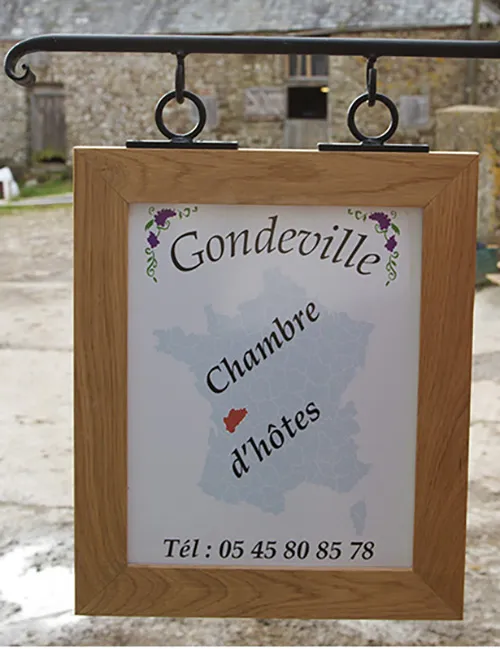 Wod framed hanging sign with printed information