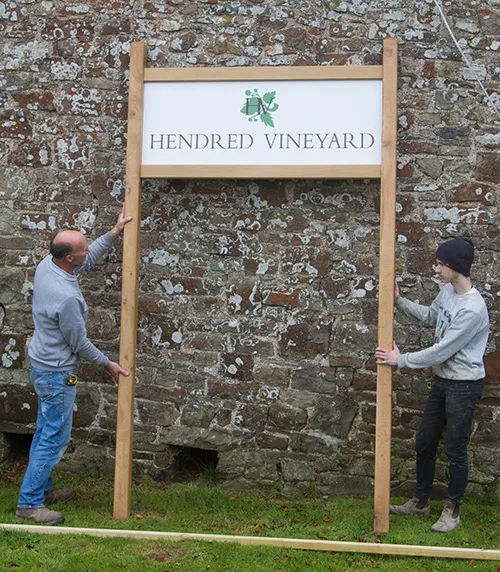 large entrance sign with post