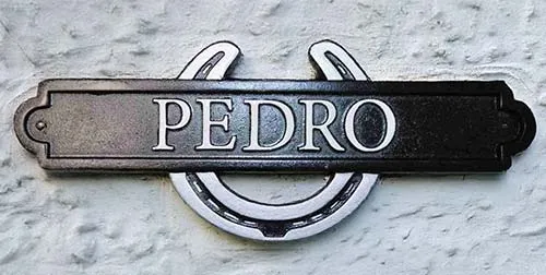 These are individually made in one piece. Cast Iron Horseshoe Sign