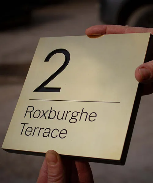 The 2 has been cut out Brass House Name Plate