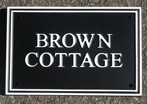 Cast rectangular house sign