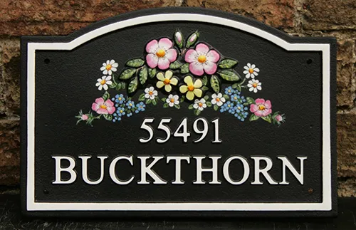 Arch top cast house sign