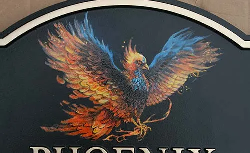 Your design hand painted onto your house sign. Pheonix House Sign