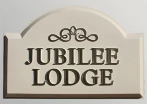 Cast arch top house sign