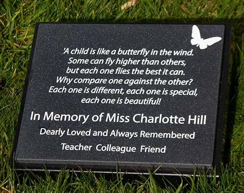 This is ideal for small text Corian Plaque on Black Granite Wedge