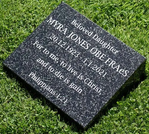 The lettering is sand blasted into the granite Dark Grey Granite Memorial Wedge