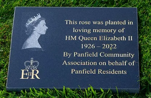 The photo was impact engraved, the lettering deep engraved. Photo on Granite