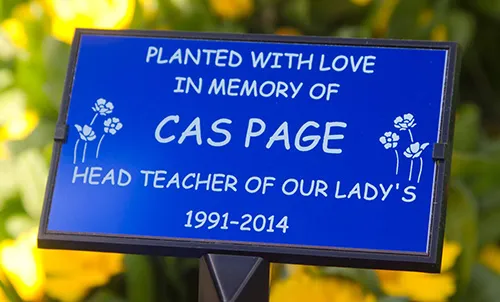Blue engraved memorial plaque