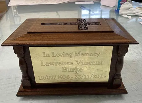 Mahogany ashes casket with shaped corners & brass plaque. Mahogany Ashes Casket