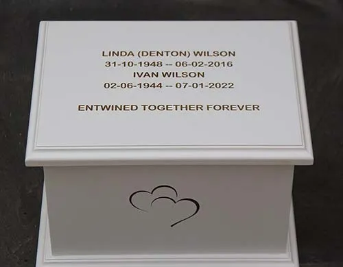 These can be pain, laser engraved or have a plaque attached. White Painted Tricoya Ashes Casket