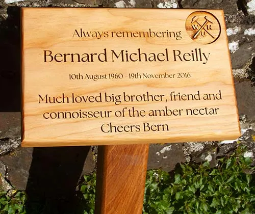 Wooden memorial plaque on a post. Wooden Memorial Plaque