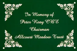 Green engraved memorial plaque