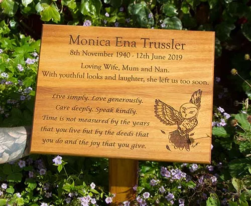 title here Wooden Memrial on a post