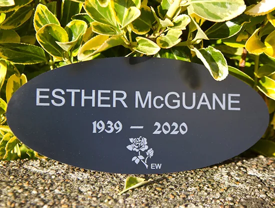Black oval shape engraved memorial