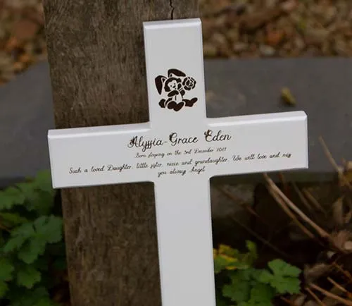 Memorial crosses can be painted or natural wood. White Painted Childs Cross