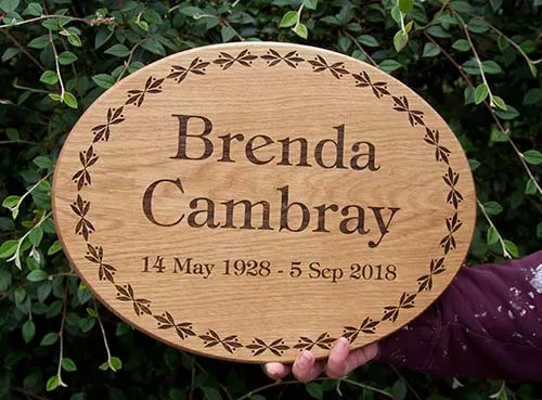 Oval Shaped Wooden Plaque with Border