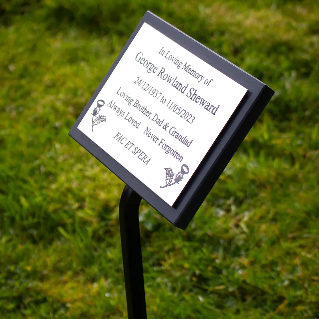 Stainless steel memorial on a wrought iron stake