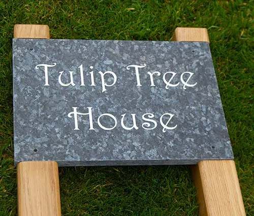 Granite sign cut into posts