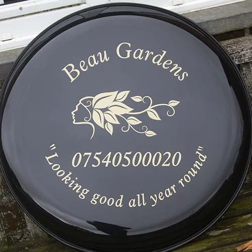 With this wheel cover the customers logo was cut out of the vinyl too. One Colour Lettering with Logo