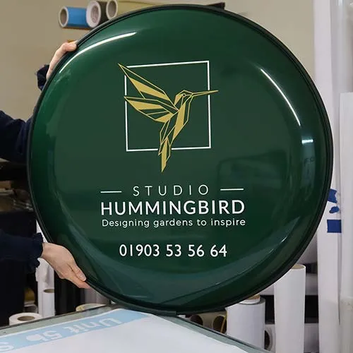 This forest green wheel cover has cut vinyl text in gold and white. Forest Green Spare Wheel Cover