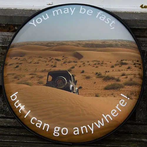 You may be fast, but I can go anywhere! Land Rover Wheel Cover