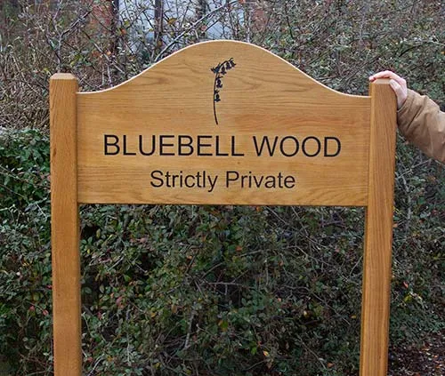 Our carpenters turn raw timber into beautiful signs. Arch Top Oak Sign On Posts