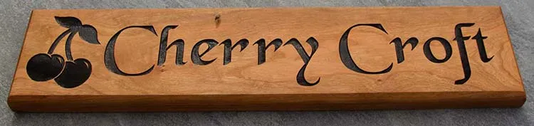 Cherry wood needs to be oiled regularly. Cherry Wood Sign Oiled