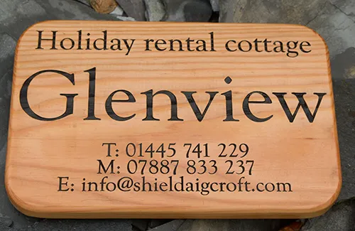 Large douglas fir business sign
