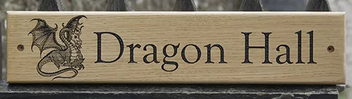 Wooden house sign with detailed image