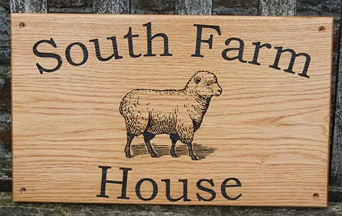 We can laser engrave and paint images as well as the lettering. Oak Farm House Sign