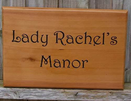 Cedar can be left untreated or oiled House Sign In Cedar Wood