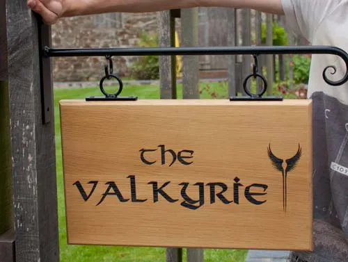 Oak Sign on Wrought Iron Bracket