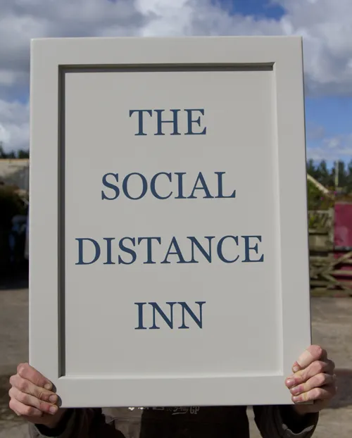 Painted wooden framed pub sign