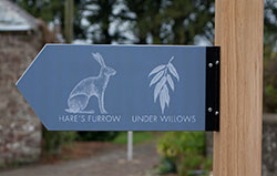 Printed directional arrow sign.