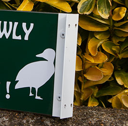 Close-up of T-channel sign.