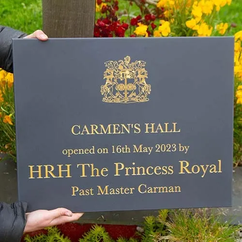 Engraved slate corian with gold paint infil. Engraved Slate Corian