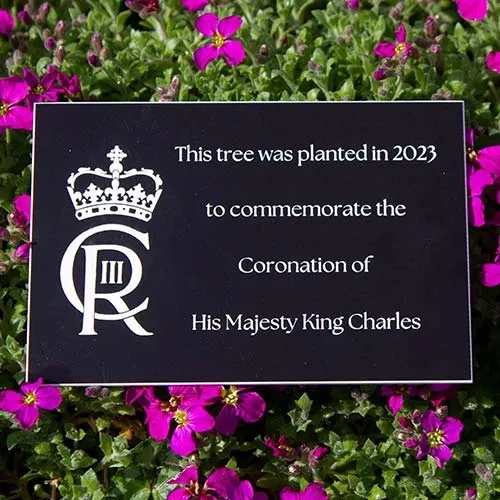This engraved plaque was made to commerorate the Coronation of King Charles. Black/White Engraved Acrylic Plaque
