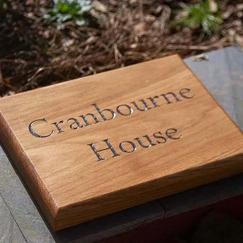 This wooden was made in Oak and Coach Koted Oak House Sign