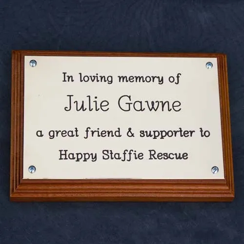 Engraved brass plaque on backing board. Engraved Brass Plaque