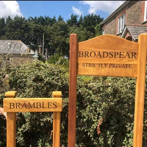 Entrance signs - front fixed and morticed. Iroko Wood Sign on Posts