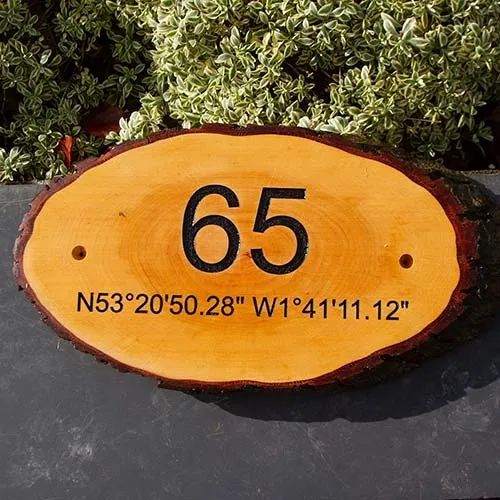 Extra text can be added below the number. Small Rustic Numer Sign