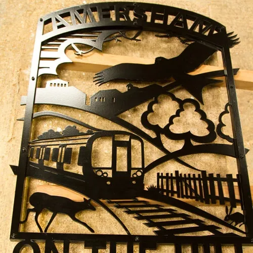 The cut out metal sign was fixed to a post Cut Out Metal Sign on a Post