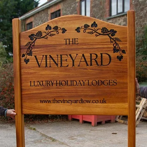 A rick coloured timber which just needs to be oiled occasionally Iroko Entrance Sign